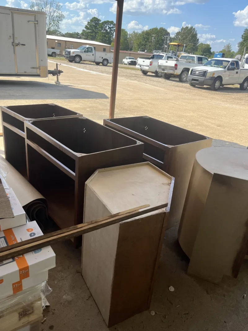 Cabinet boxes staged outside for an office build-out
