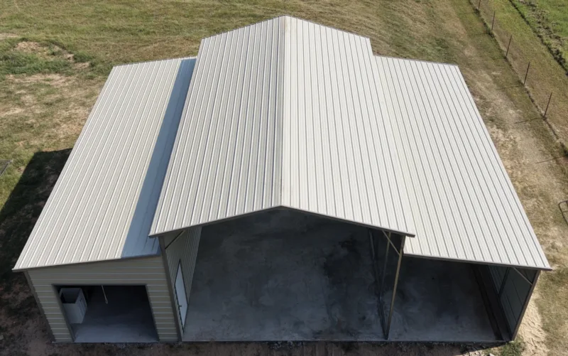 Metal barn with a raised centre aisle and lean-tos, seen from above