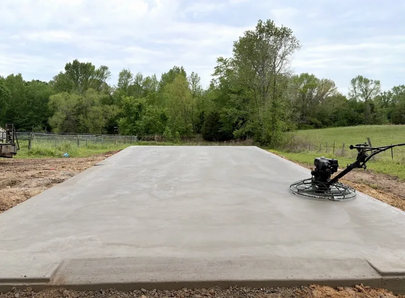 Power trowel on a fresh slab in an open field
